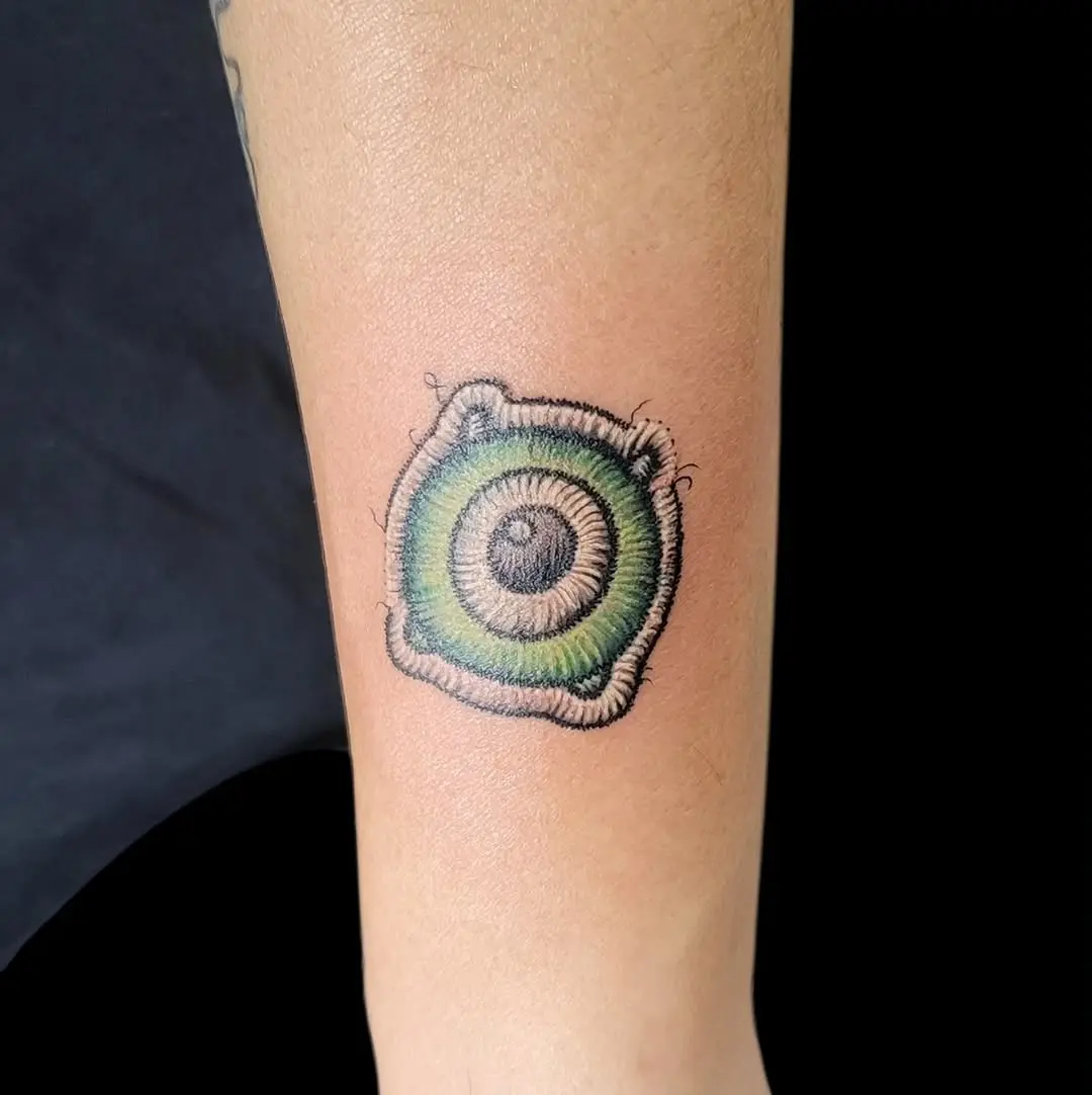 Intricately Designed Eye Embroidery Tattoo