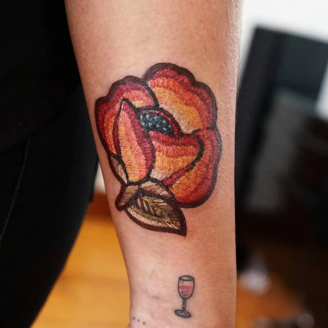 Colorful Flower Embroidery Tattoo with Leaves