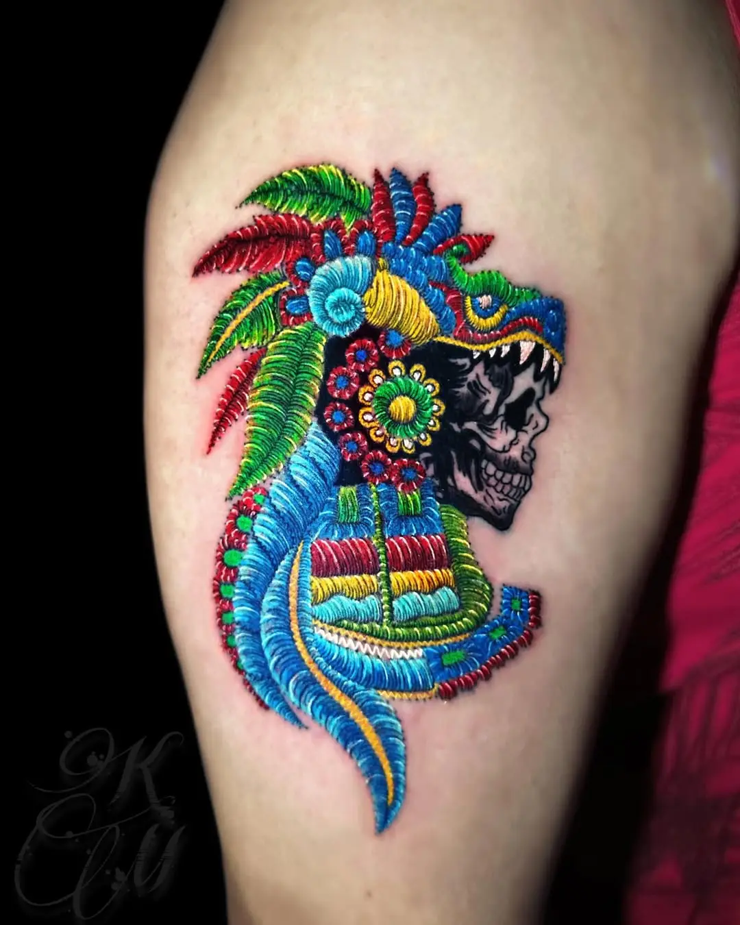 Vibrant Embroidery-Inspired Skull Tattoo Art