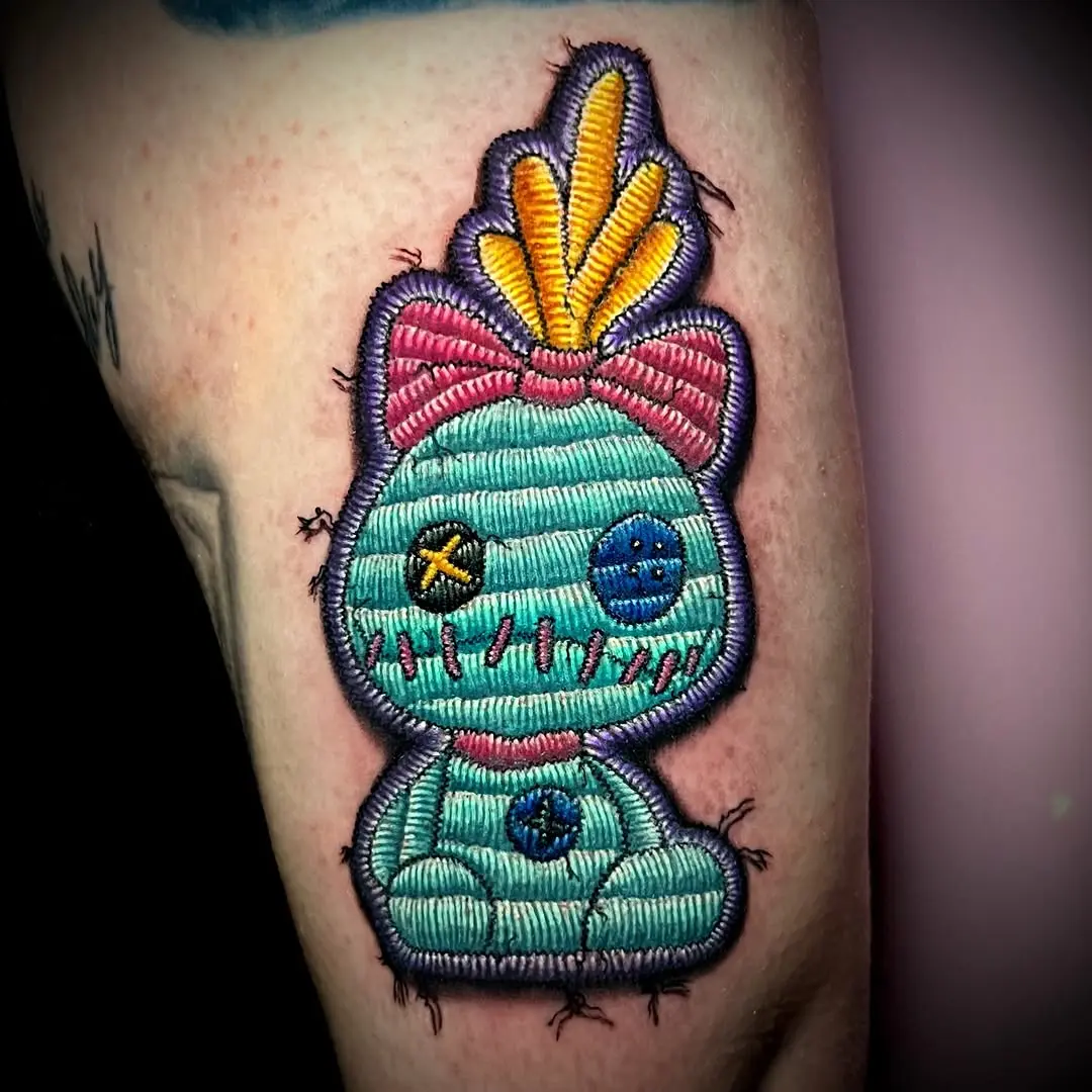 Charming vintage-inspired stitched character tattoo