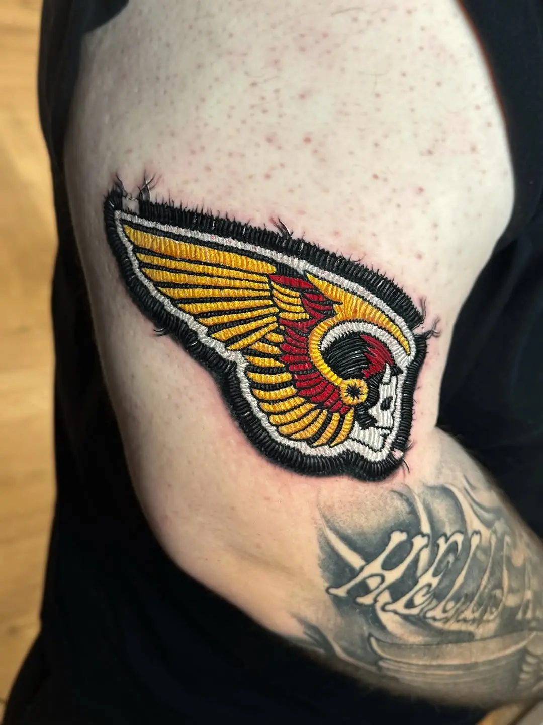 Vibrant Wing Design Embroidery Tattoo