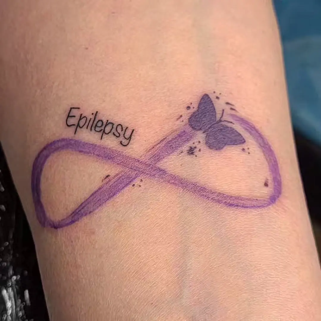 Elegant infinity symbol with butterfly design