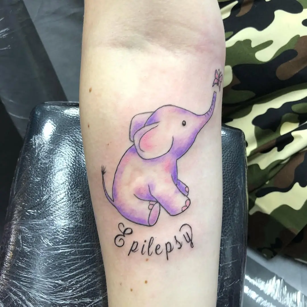 Whimsical elephant tattoo symbolizing epilepsy awareness