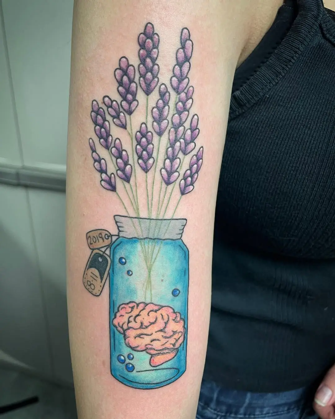 Symbolic epilepsy tattoo with brain and lavender