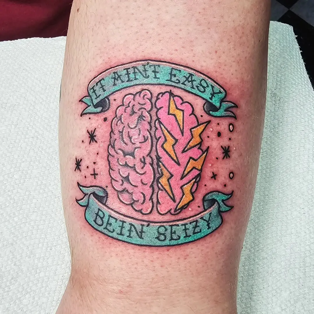 Vibrant Brain Tattoo with Lightning Strikes