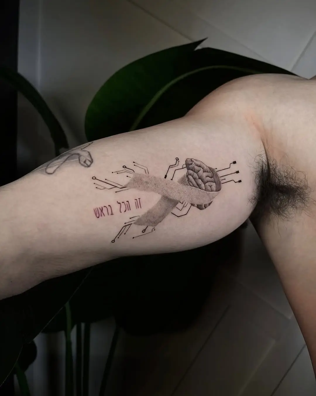 Unique brain and ribbon tattoo for epilepsy awareness