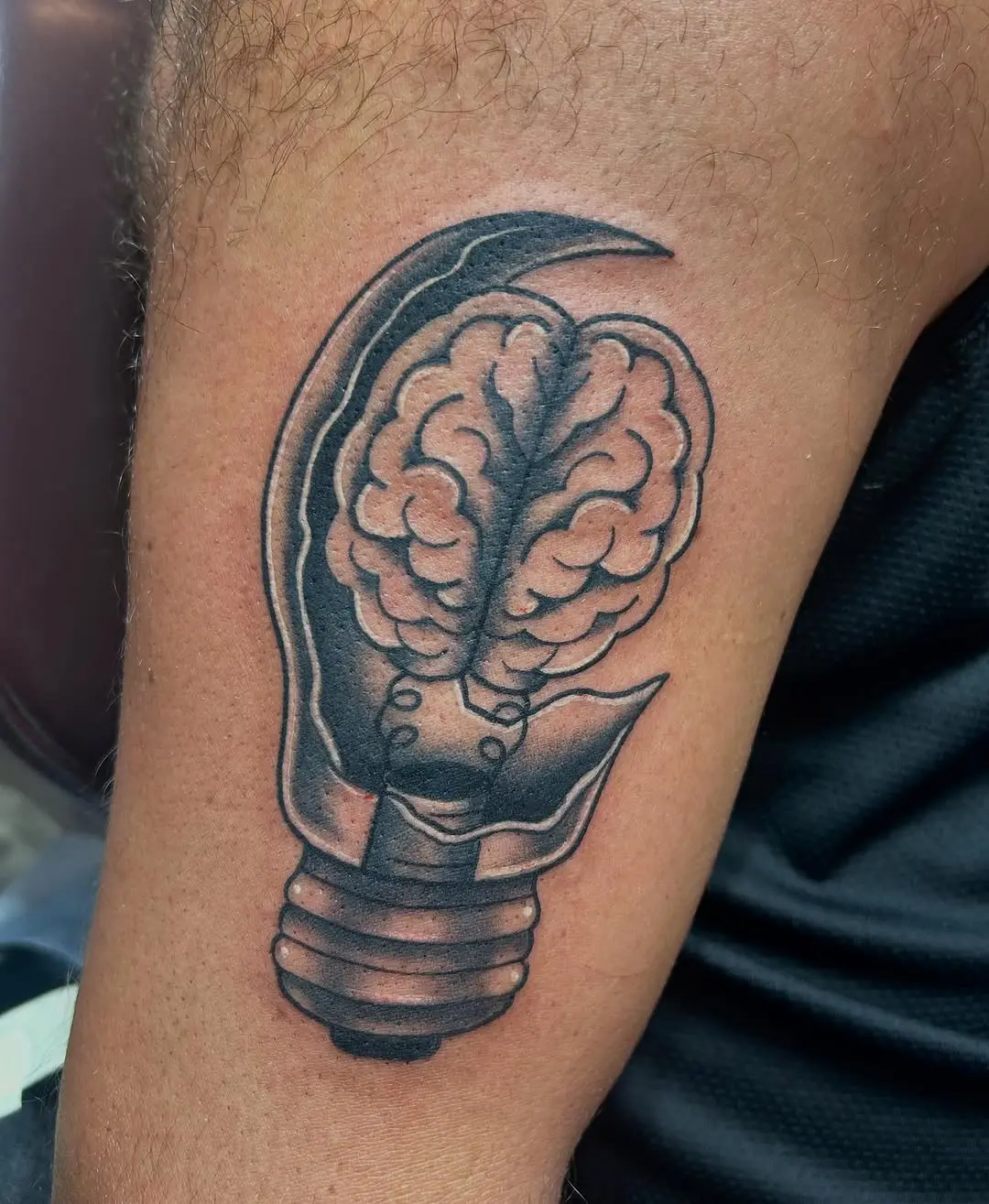 Creative brain light bulb tattoo design