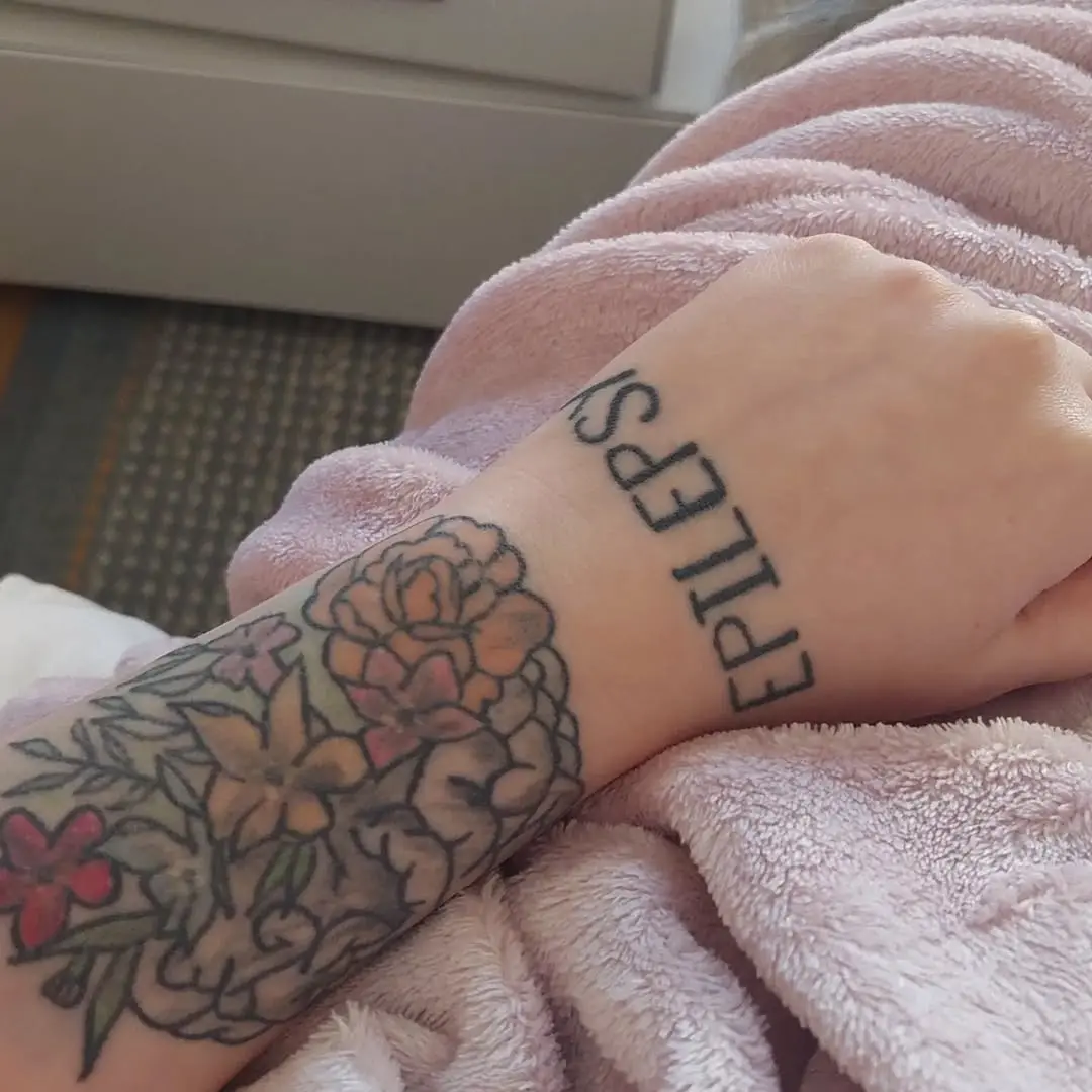 Floral Epilepsy Tattoo with Strong Message