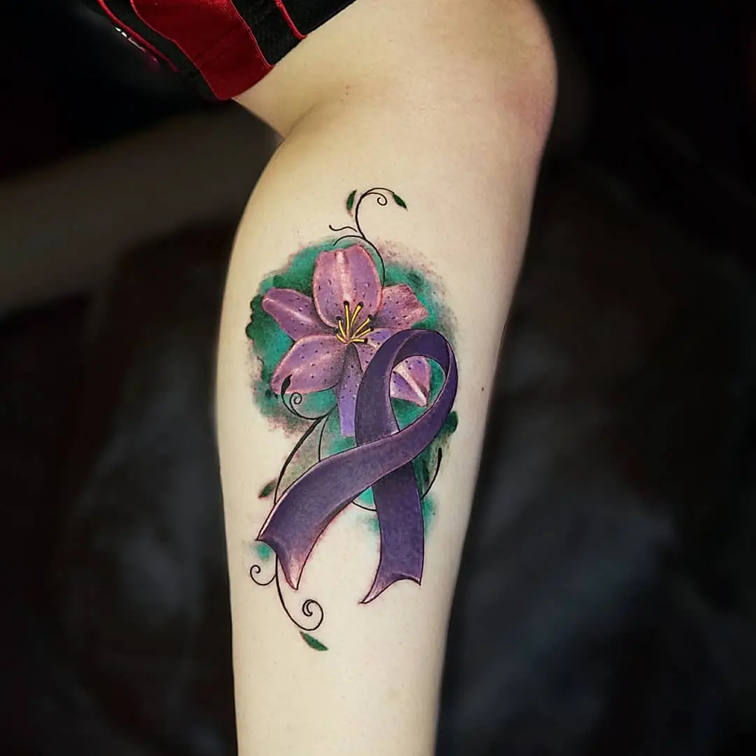 Vibrant flower with a purple ribbon tattoo