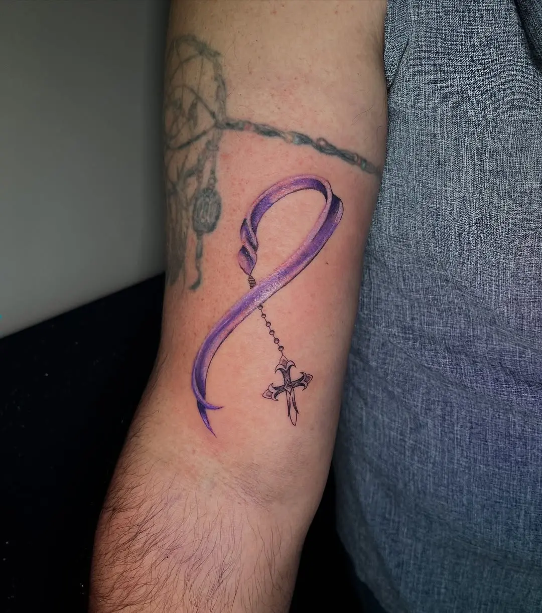 Elegant purple ribbon symbolizes strength and awareness