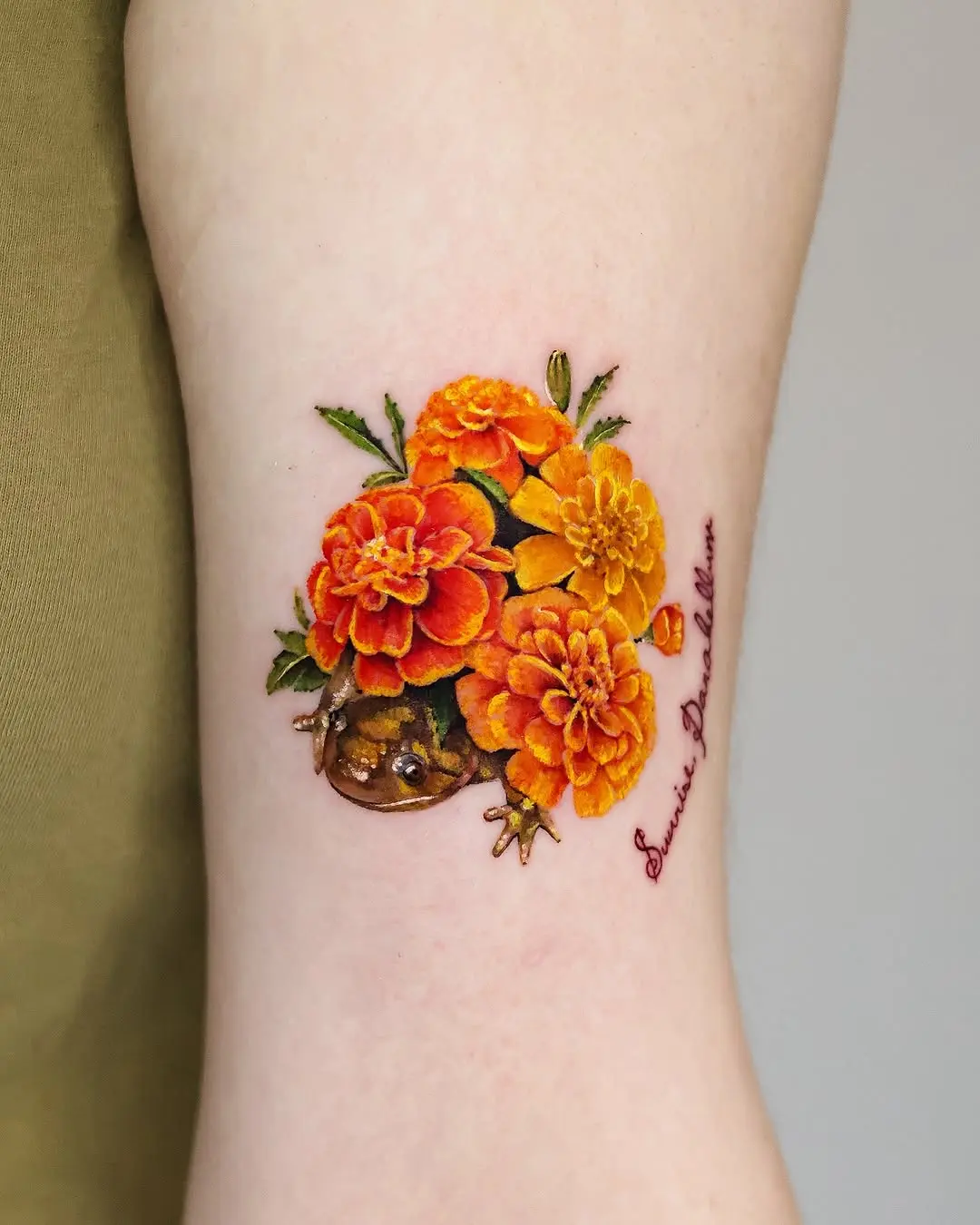 Vibrant marigold tattoo with a unique twist