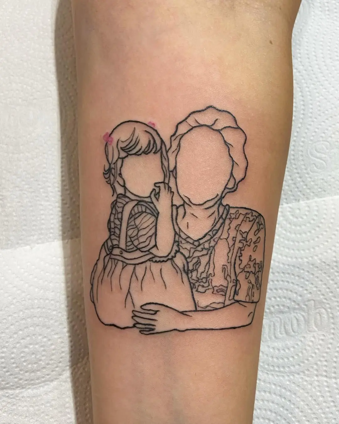 Heartwarming Grandma and Child Tattoo Design