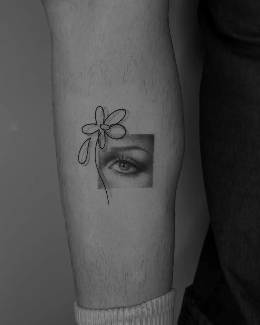 Intricate Eye Flower Tattoo Design