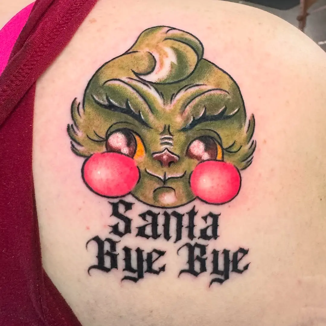 Charming Grinch Tattoo with Playful Vibes