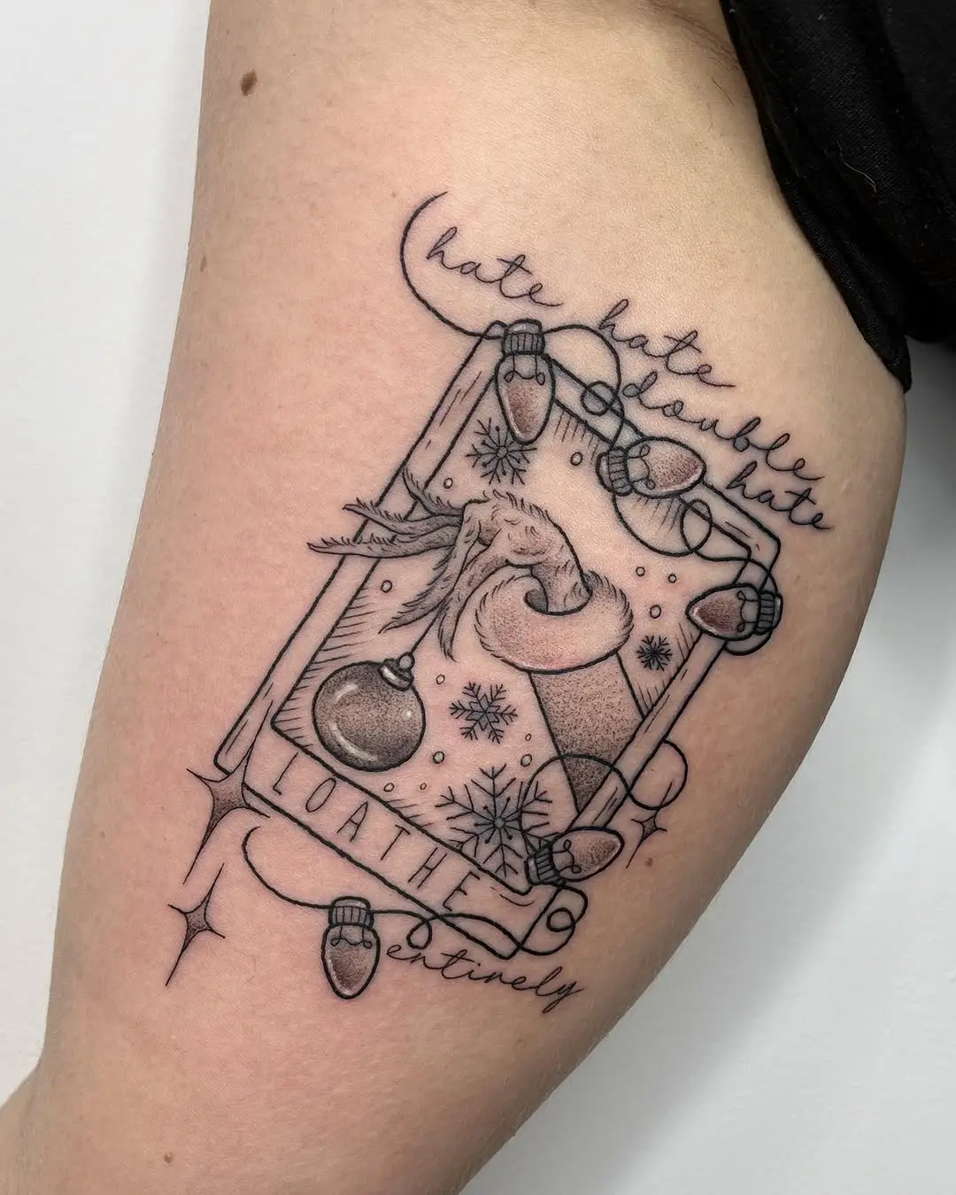 Whimsical Grinch tattoo showcasing holiday spirit