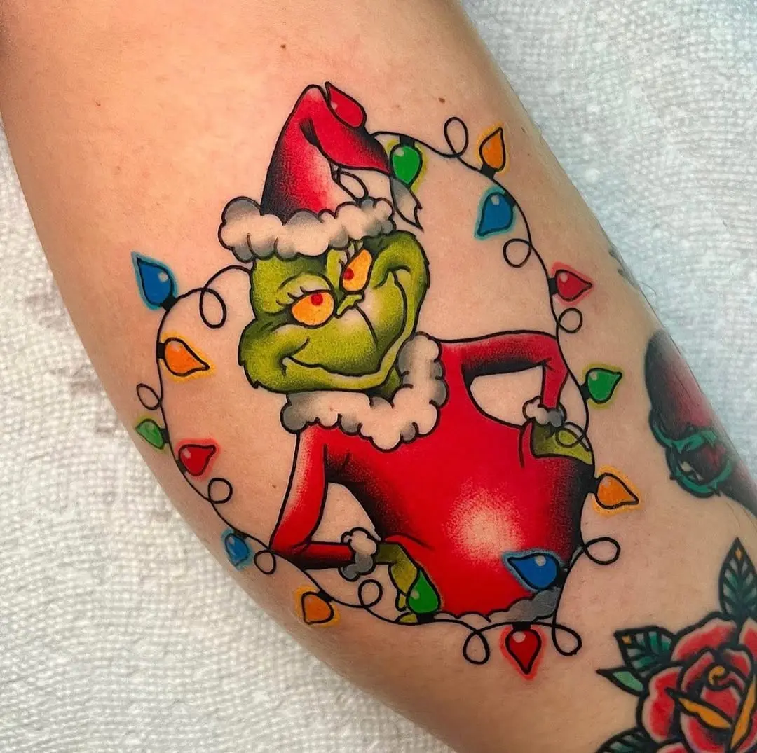 Colorful Grinch Tattoo with Christmas Lights