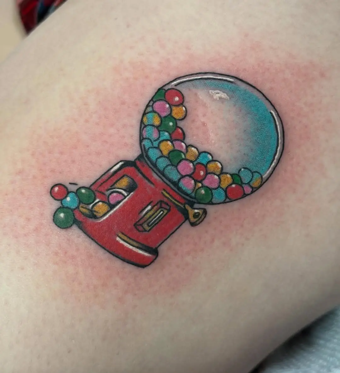 Playful gumball machine bubble gum tattoo design