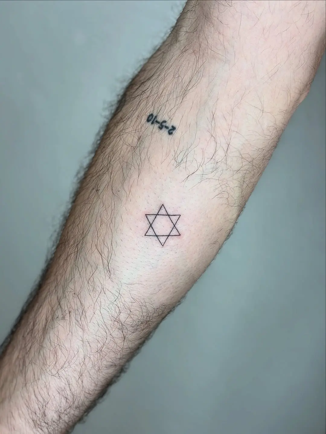 Minimalist Star of David Tattoo Design