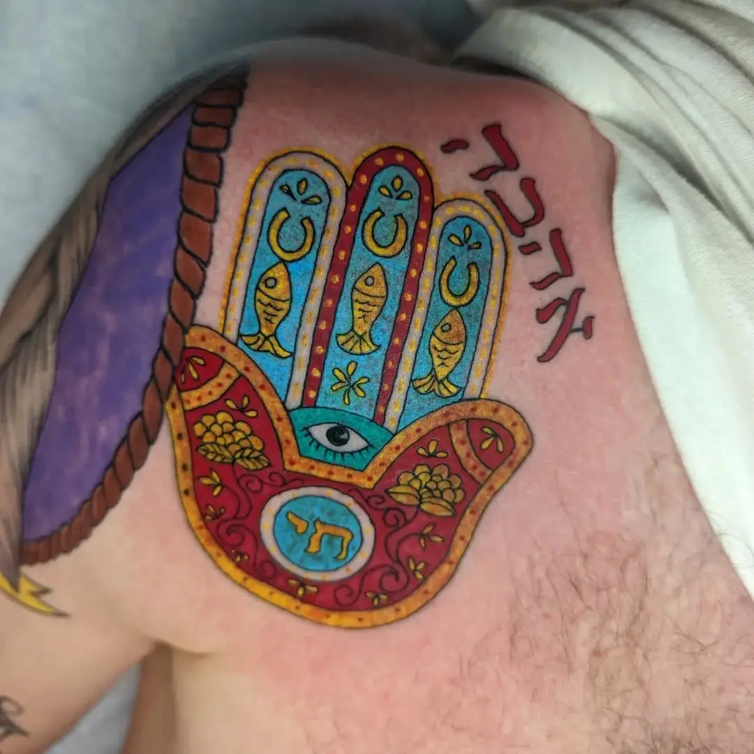 Vibrant Hamsa Design with Hebrew Letters