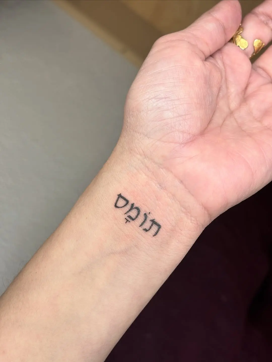 Meaningful Hebrew Tattoo on Wrist