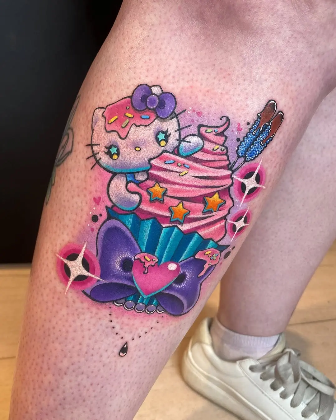 Delightful Hello Kitty Cupcake Tattoo Design