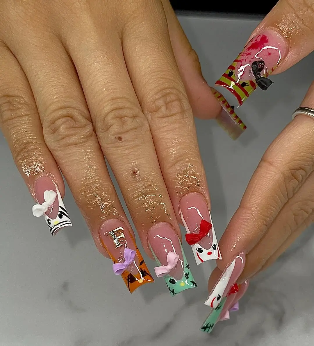 Festive Hello Kitty-inspired Nail Design