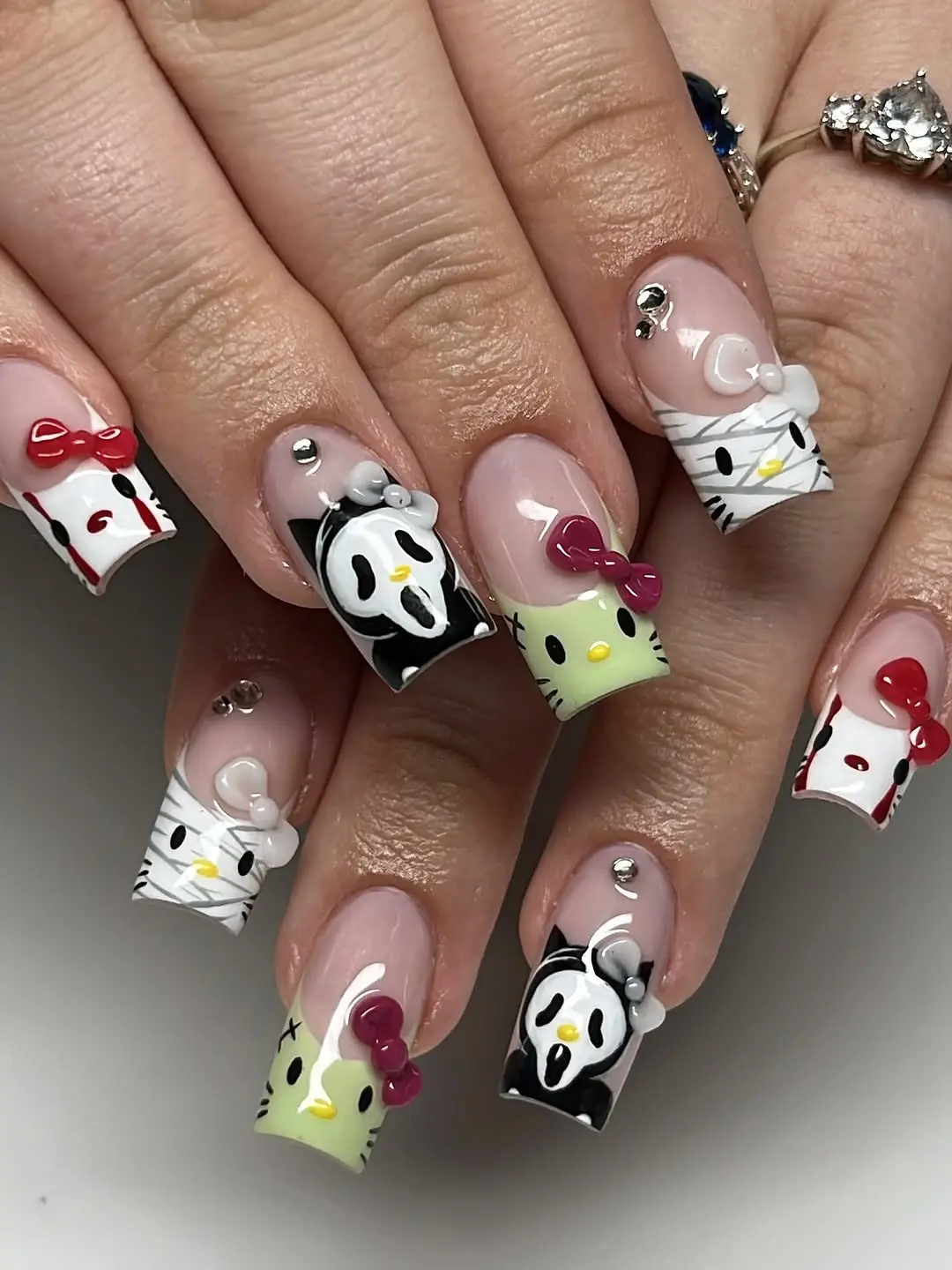 Fun and colorful Hello Kitty nail art