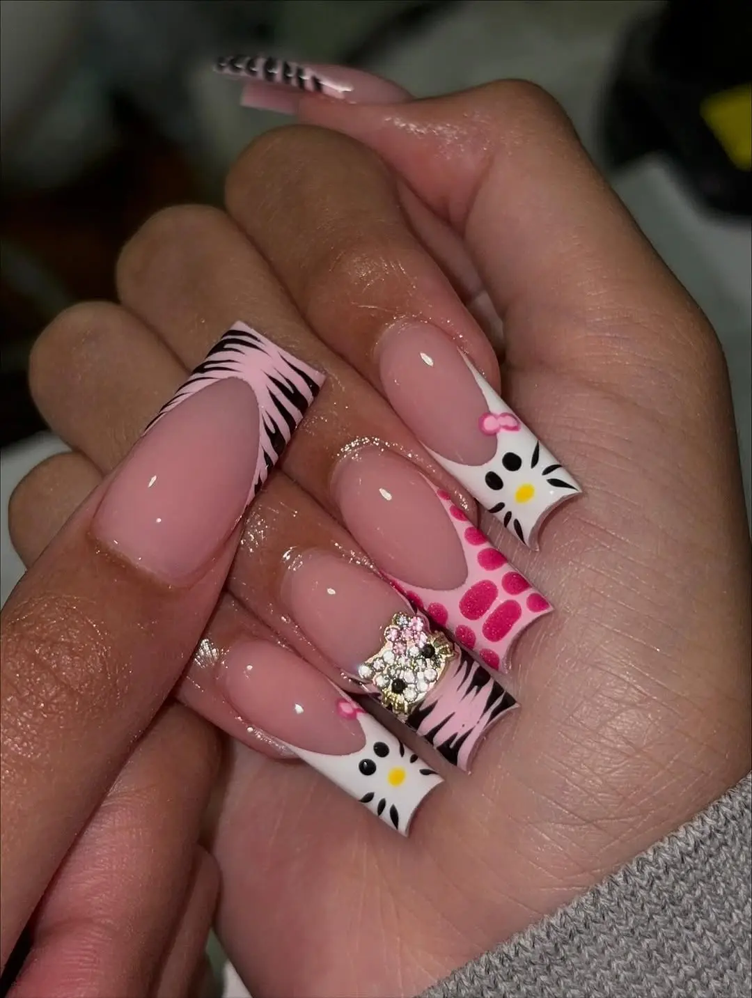 Cute Hello Kitty-inspired nail art design