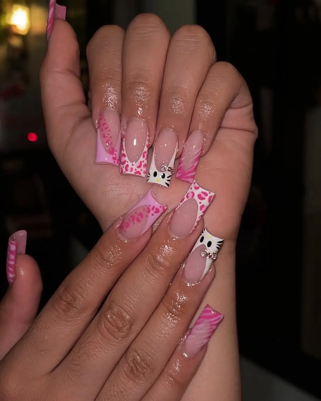 Cute Hello Kitty Themed Nail Design for Fun