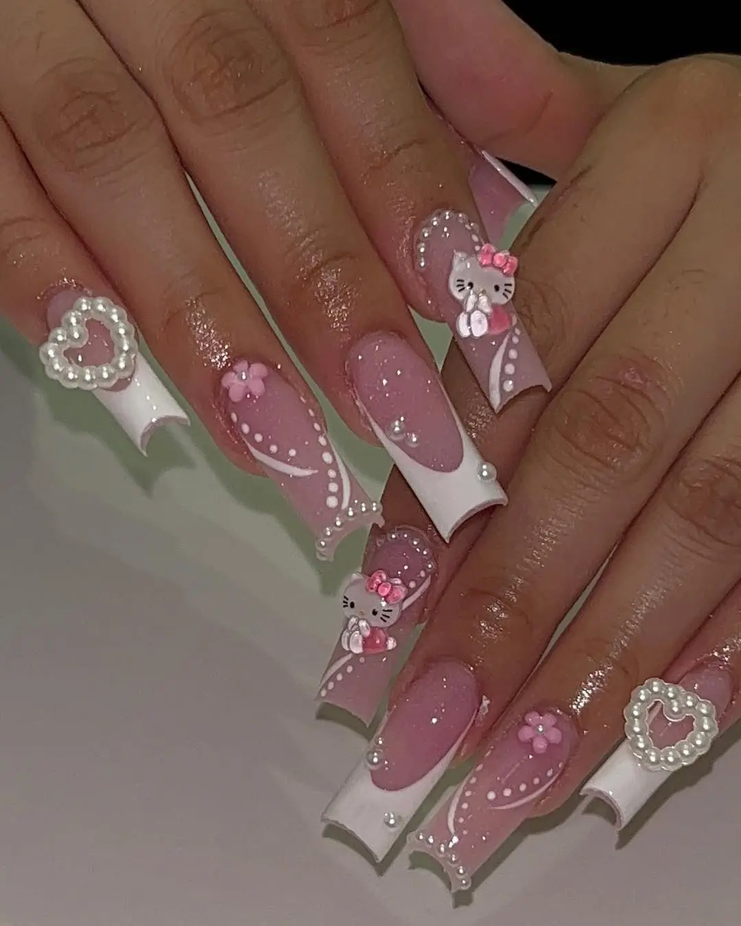 Charming Hello Kitty Nail Art Designs for Fans