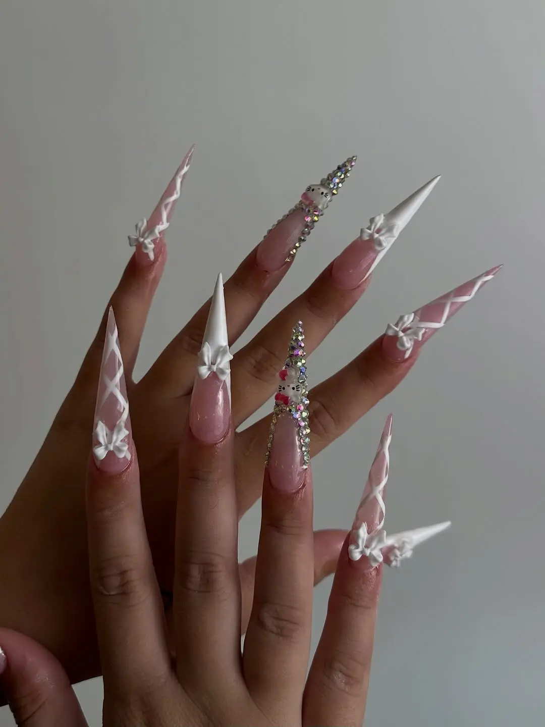 Playful and Glamorous Hello Kitty-Inspired Nails