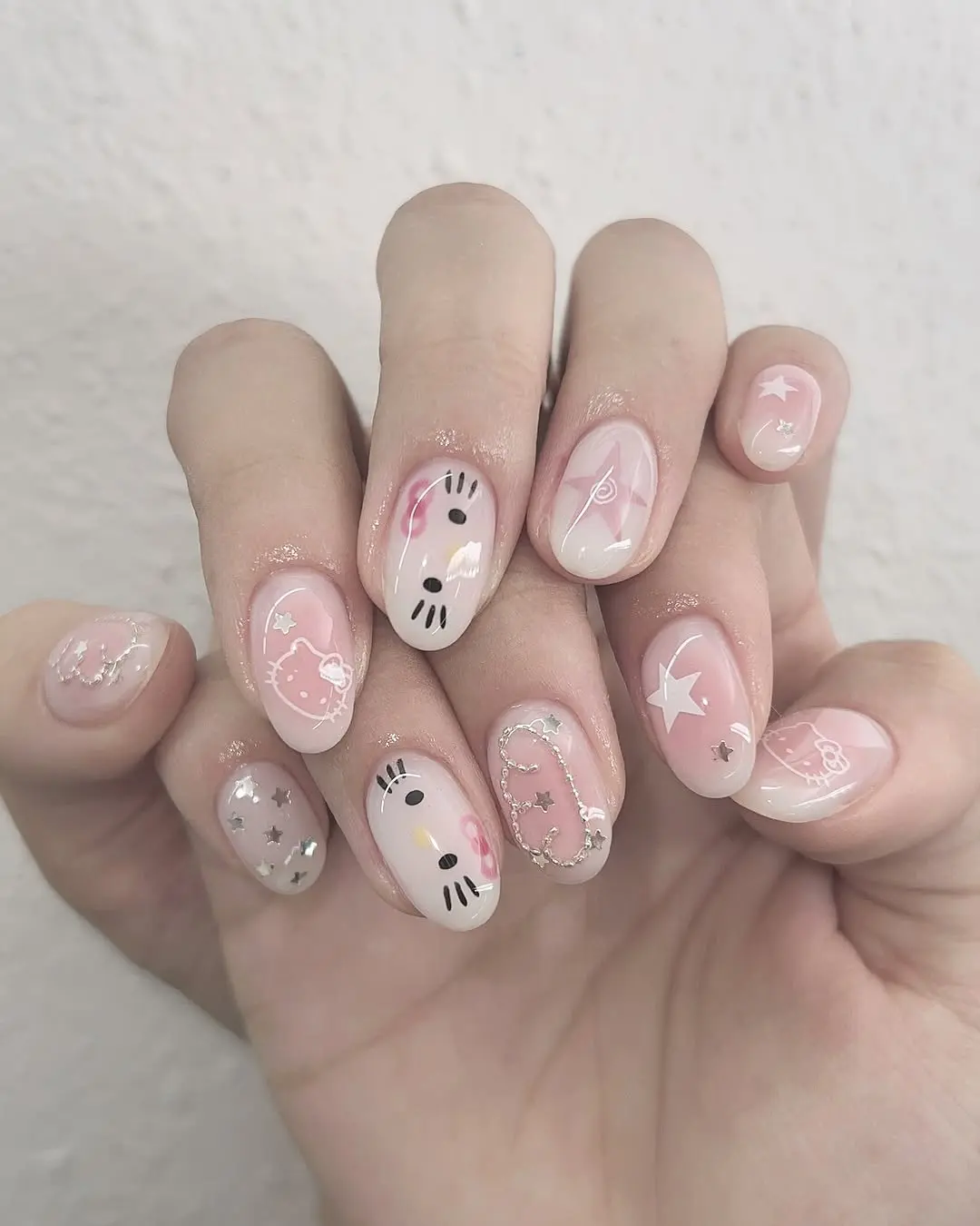 Charming pink Hello Kitty nail art design