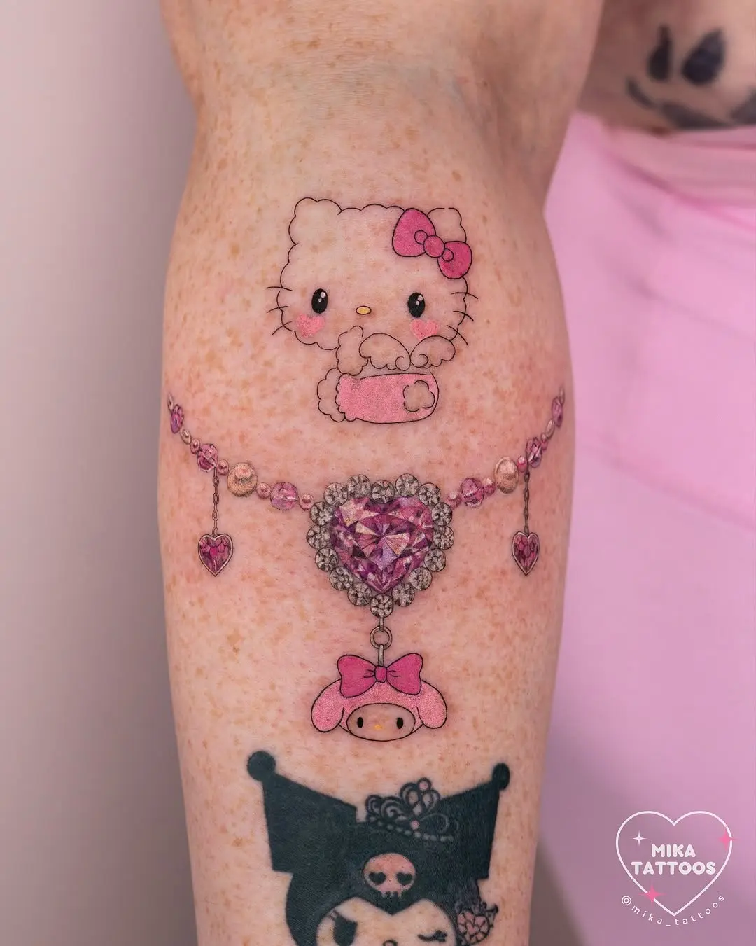 Charming Hello Kitty Tattoo with Heart Accents