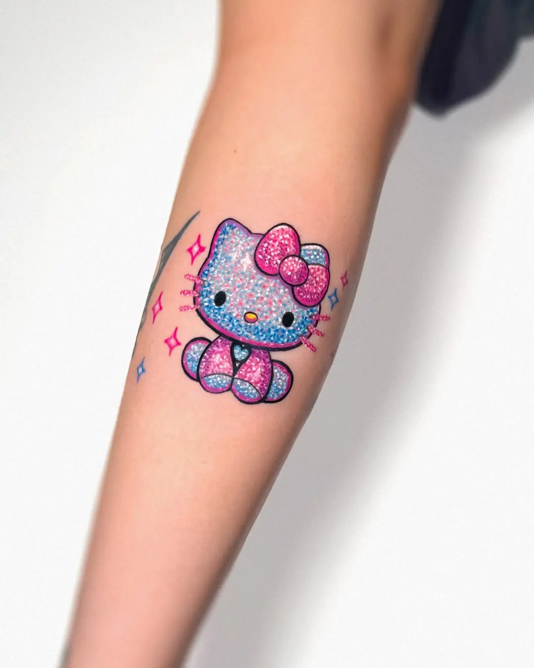 Vibrant Glitter Hello Kitty Tattoo Design