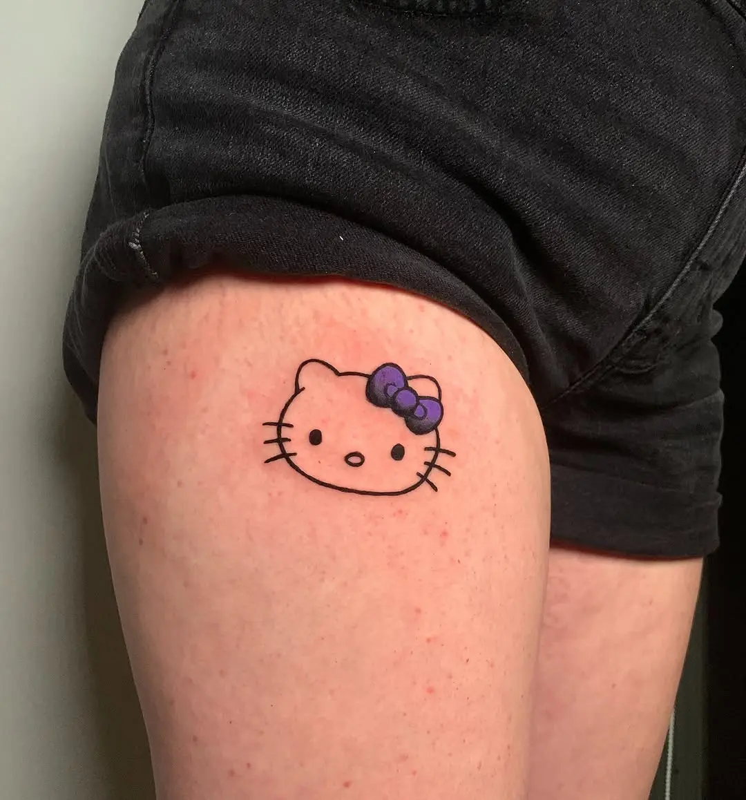 Charming Hello Kitty Thigh Tattoo Design