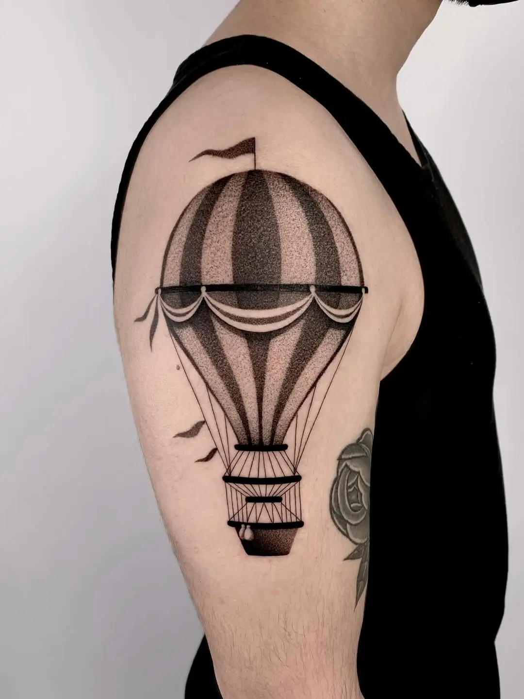 Elegant dotwork hot air balloon tattoo design