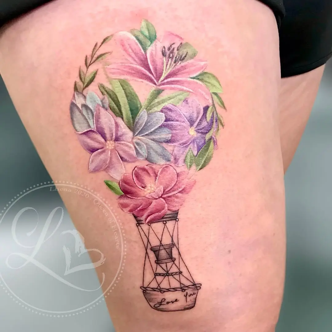 Whimsical floral hot air balloon tattoo design