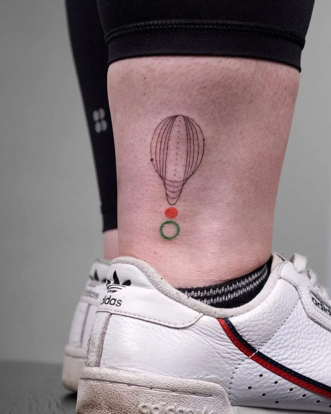 Minimalist Hot Air Balloon Leg Tattoo Design