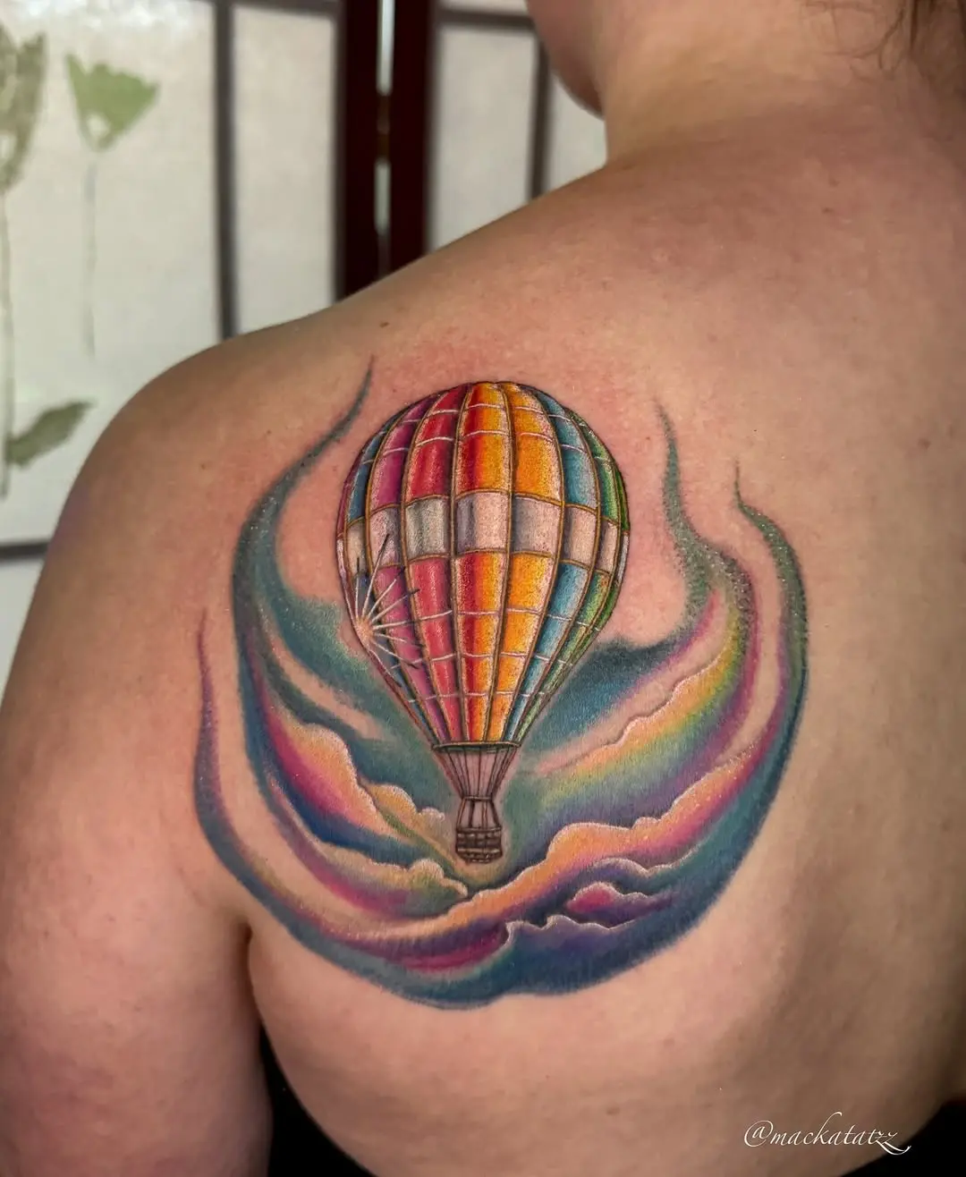 Colorful hot air balloon tattoo for free spirits