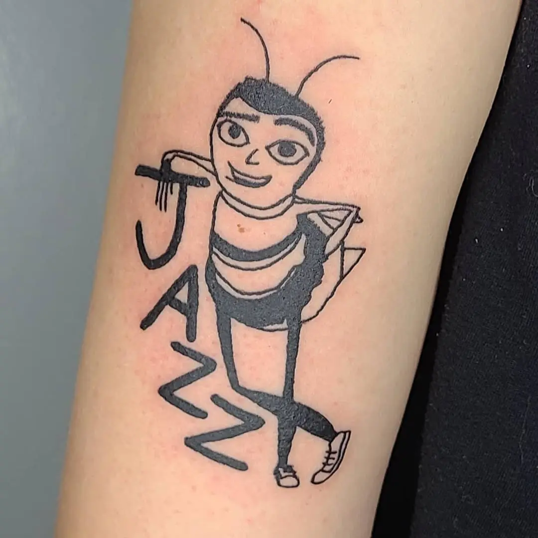 Unique jazz-themed bee character tattoo