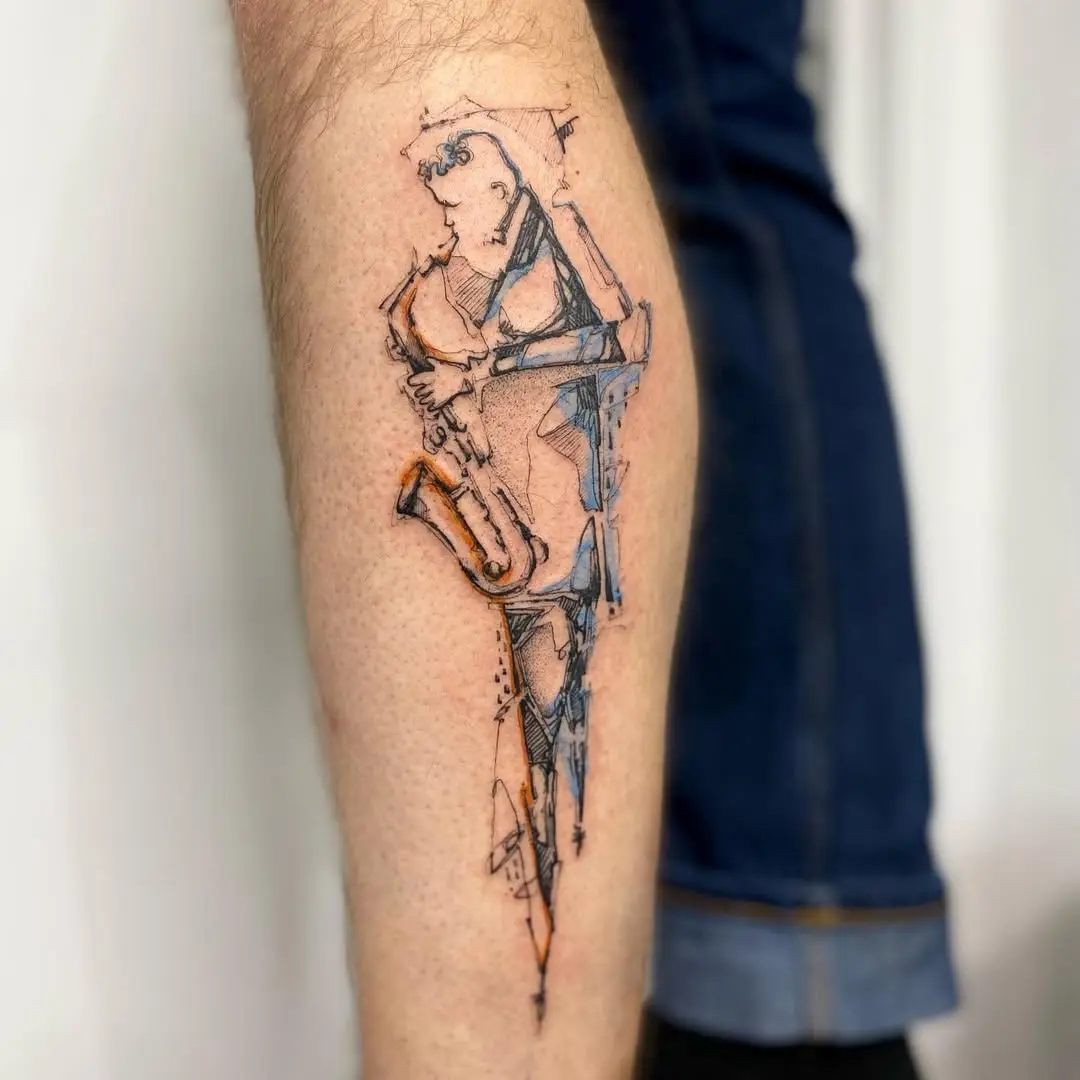 Artistic saxophonist tattoo in vibrant colors