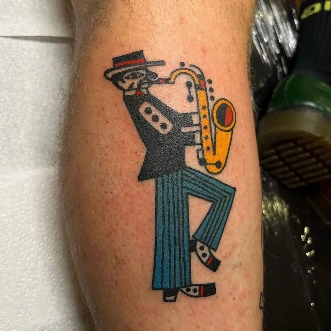 Stylish jazz saxophonist tattoo in vibrant colors