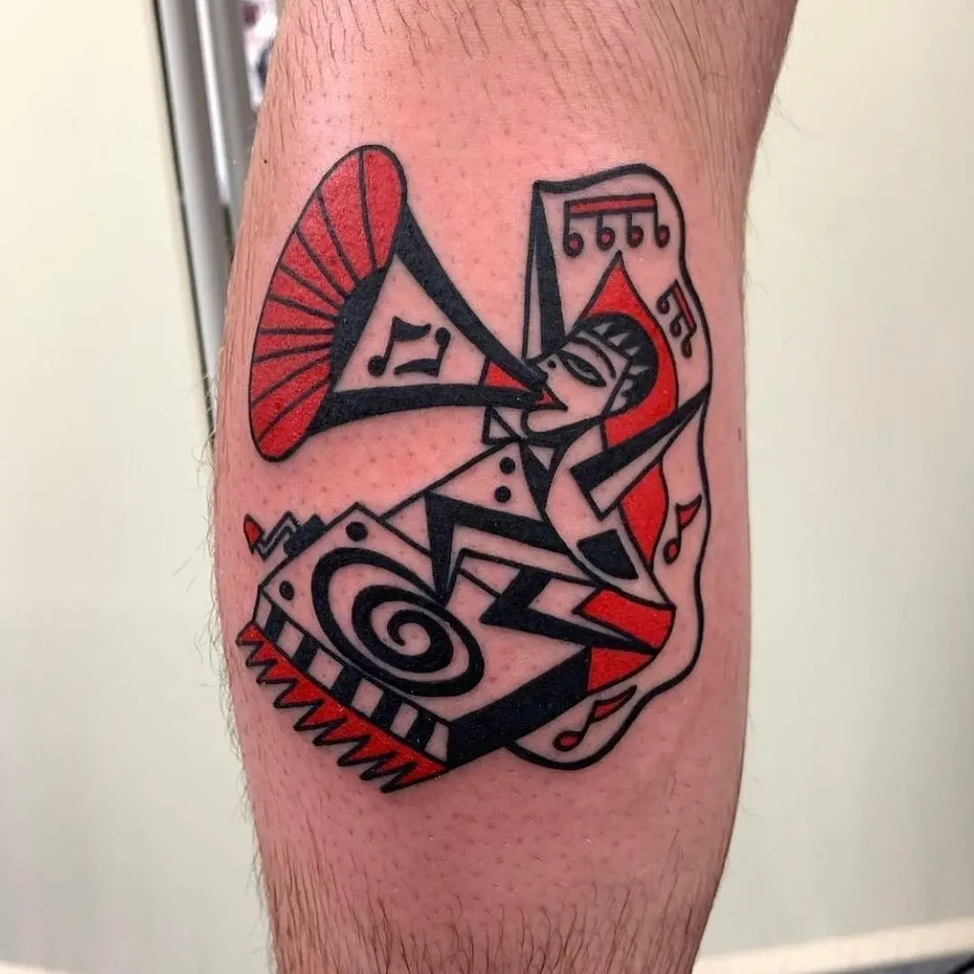 Abstract jazz tattoo featuring vibrant colors and shapes