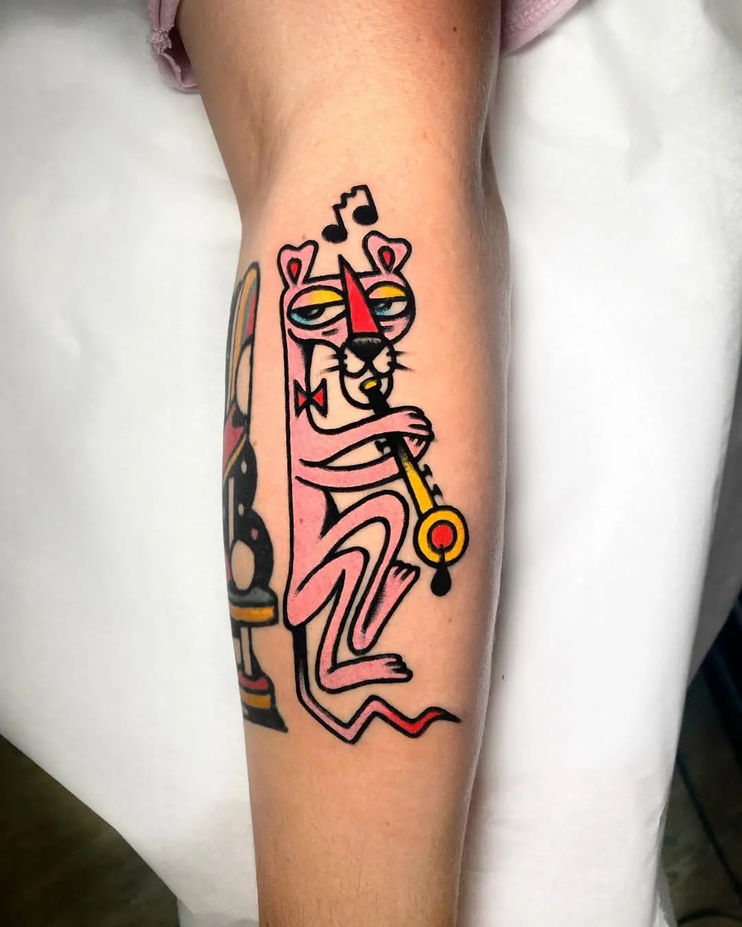 Colorful jazz tattoo with playful character