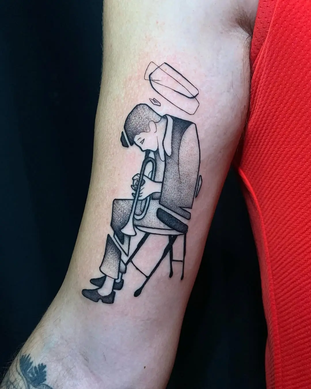 Artistic jazz trumpet player tattoo design