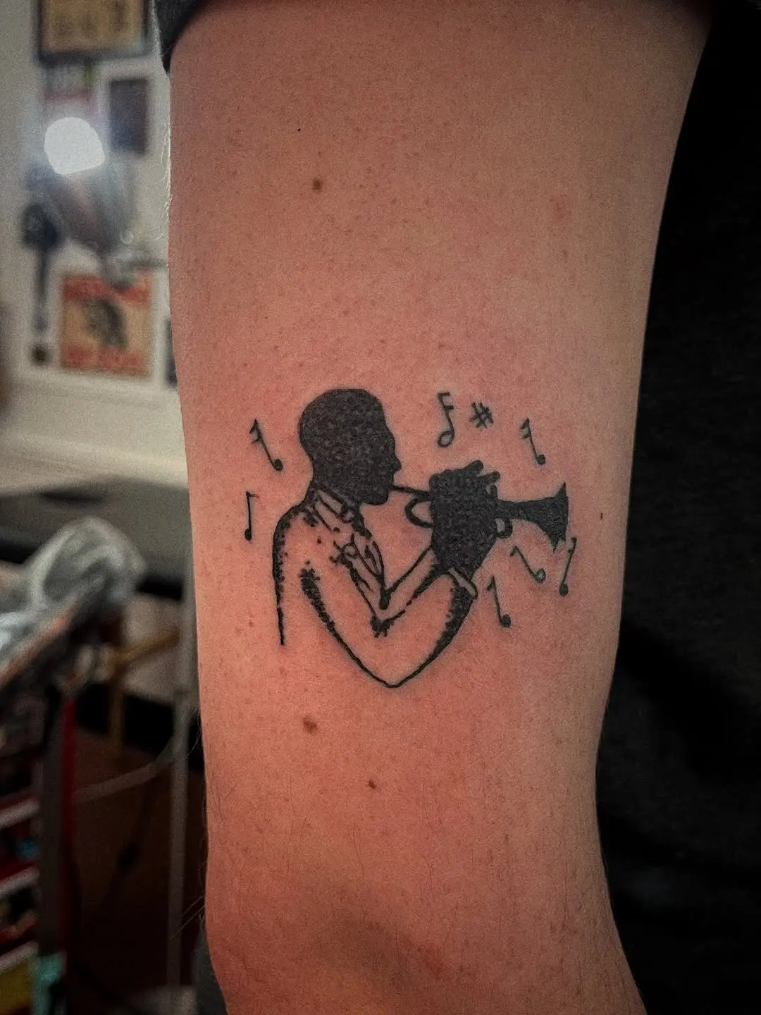 Elegant jazz trumpet tattoo captures musical passion