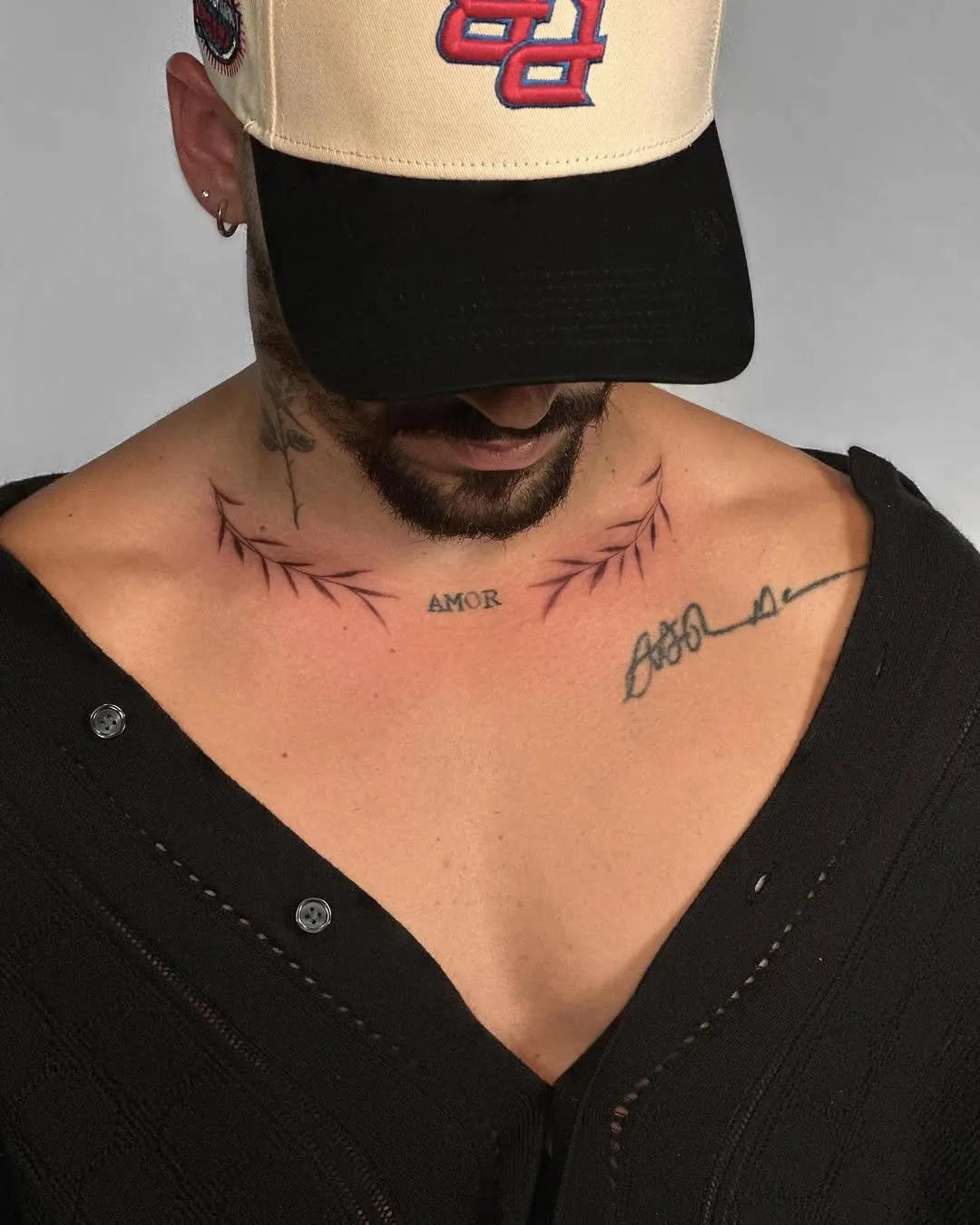 Stylish laurel wreath tattoo on the chest