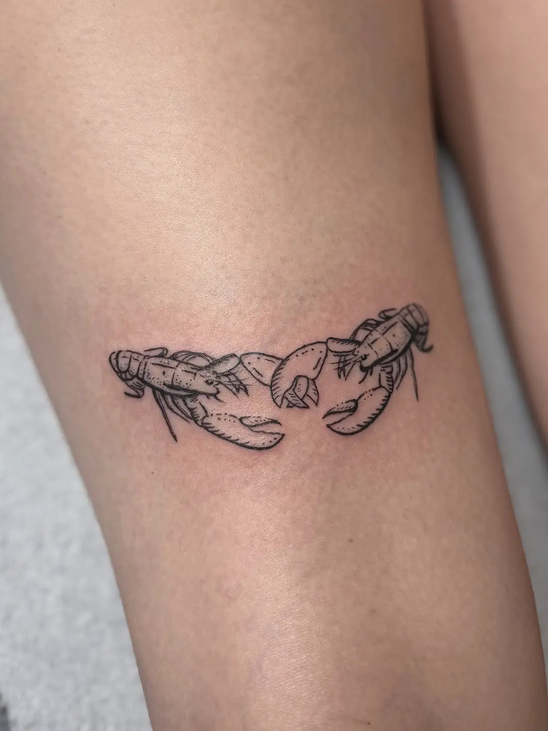 Intricate lobster tattoo design for passionate lovers