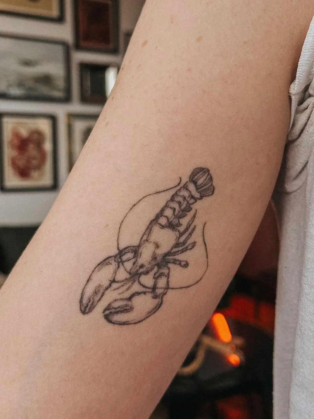 Minimalist Lobster Tattoo in Black Ink