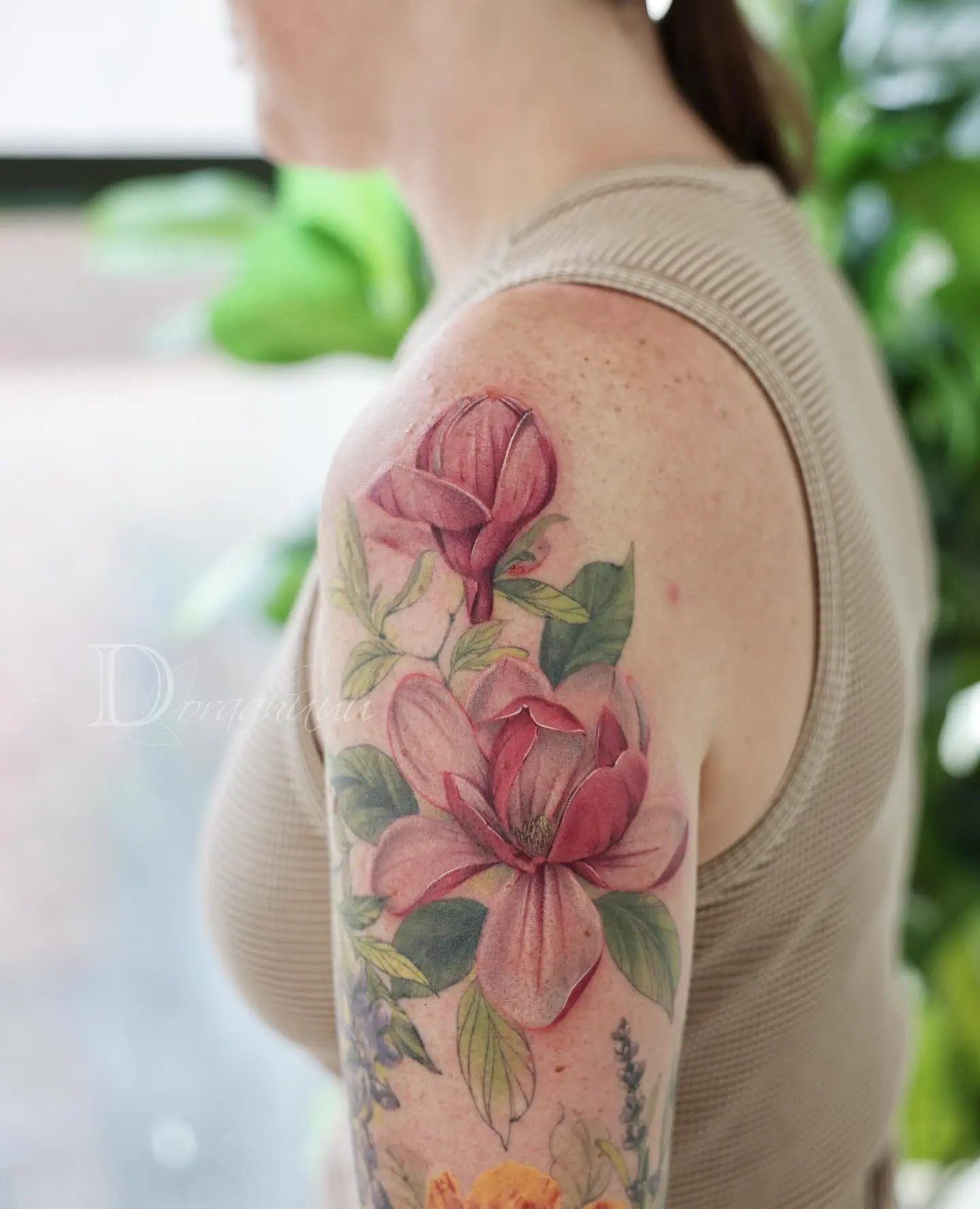 Elegant magnolia tattoo showcasing natural beauty